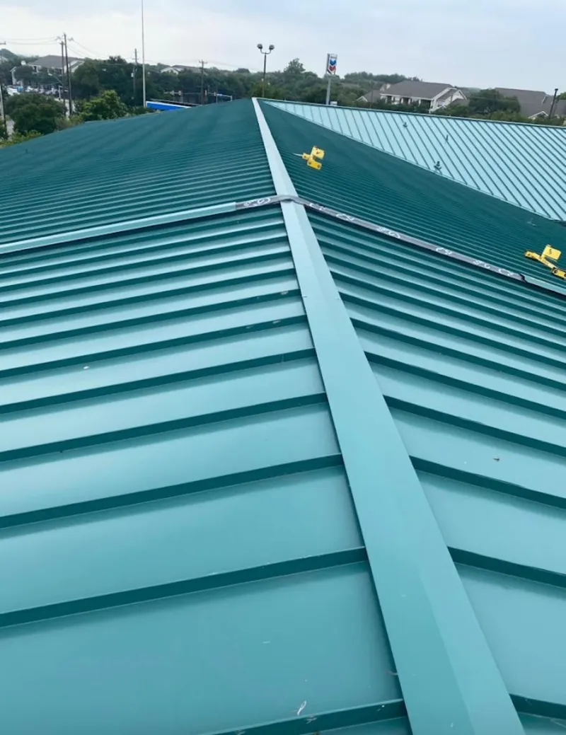 Green commercial metal roof ridge and valley for Metal Roof Repair in Winnetka