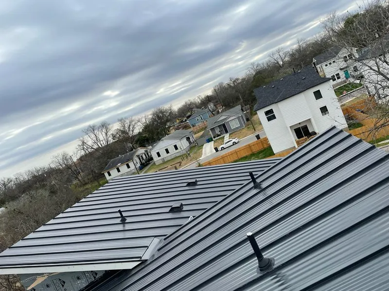 Standing seam metal roof panels with vents for Skylight Repair in Winnetka